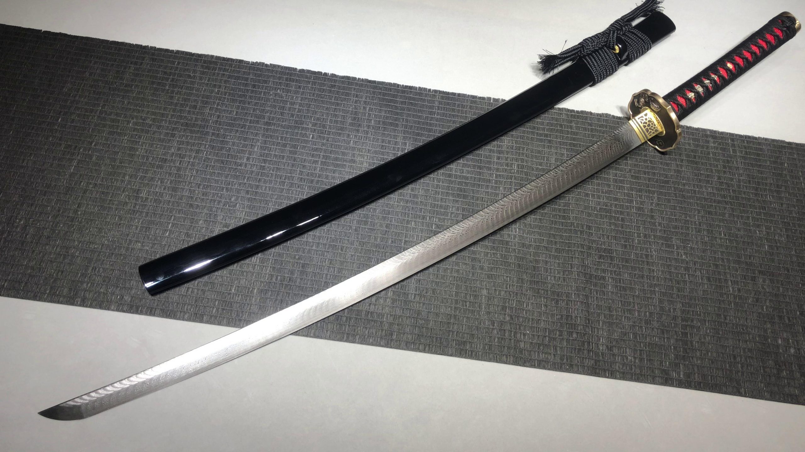 KageForge5 product image: 26" Pattern Steel Katana with Pure Copper Fittings