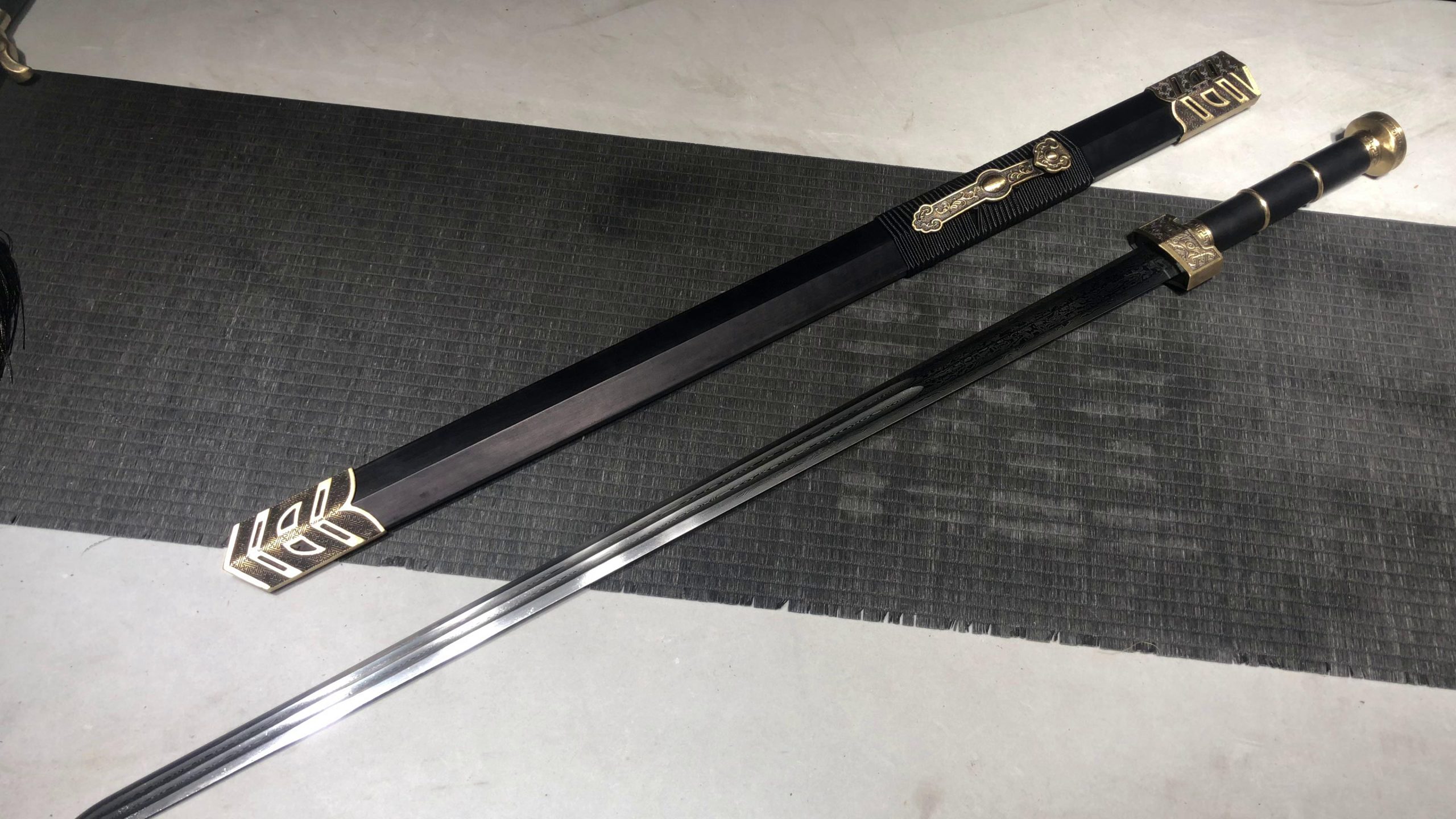 KageForge5 product image: 28" Pattern Steel Japanese Sword with Pure Copper Fittings