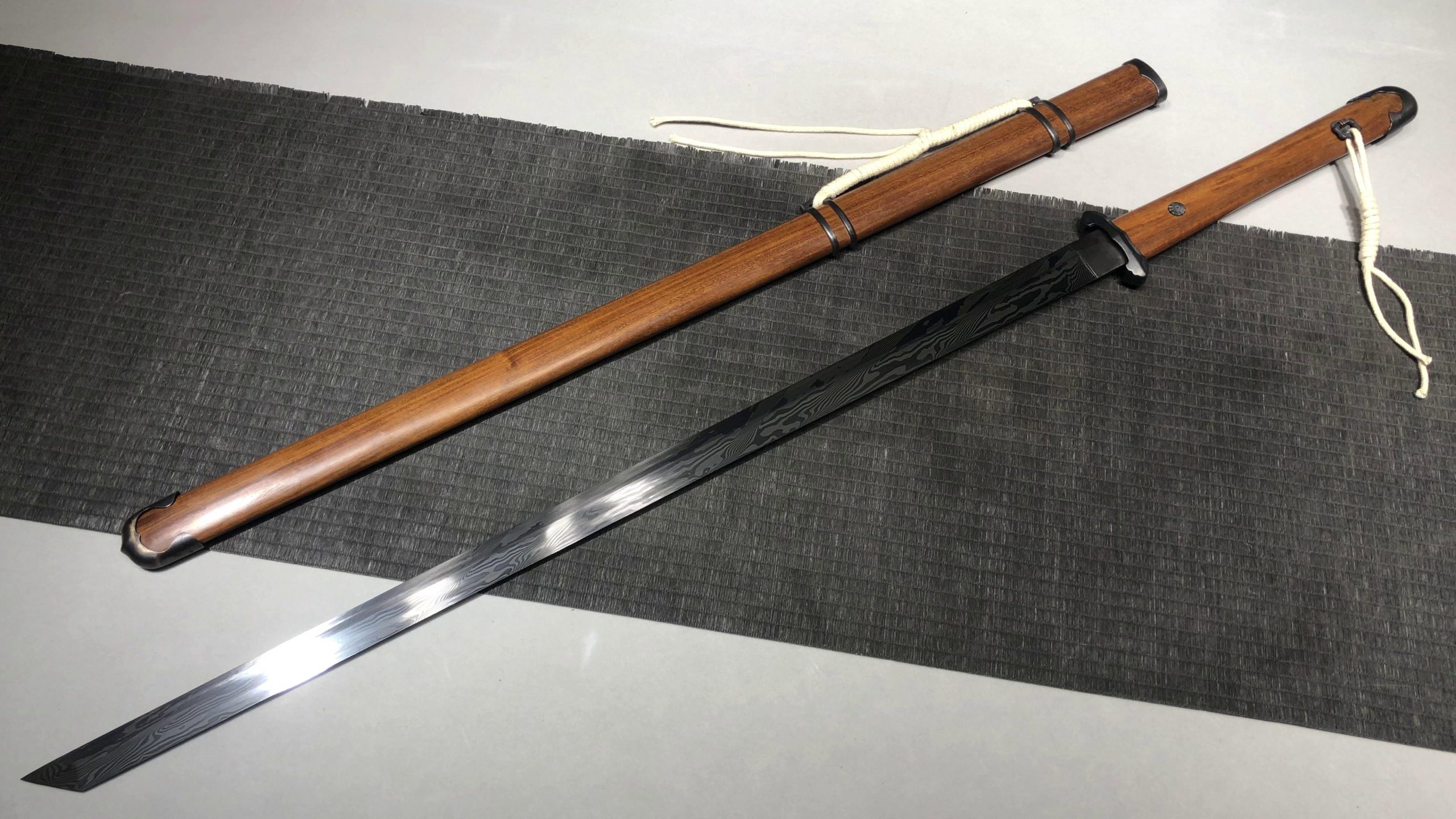 KageForge5 product image: 26" Pattern Steel Japanese Sword with Pure Copper Fittings