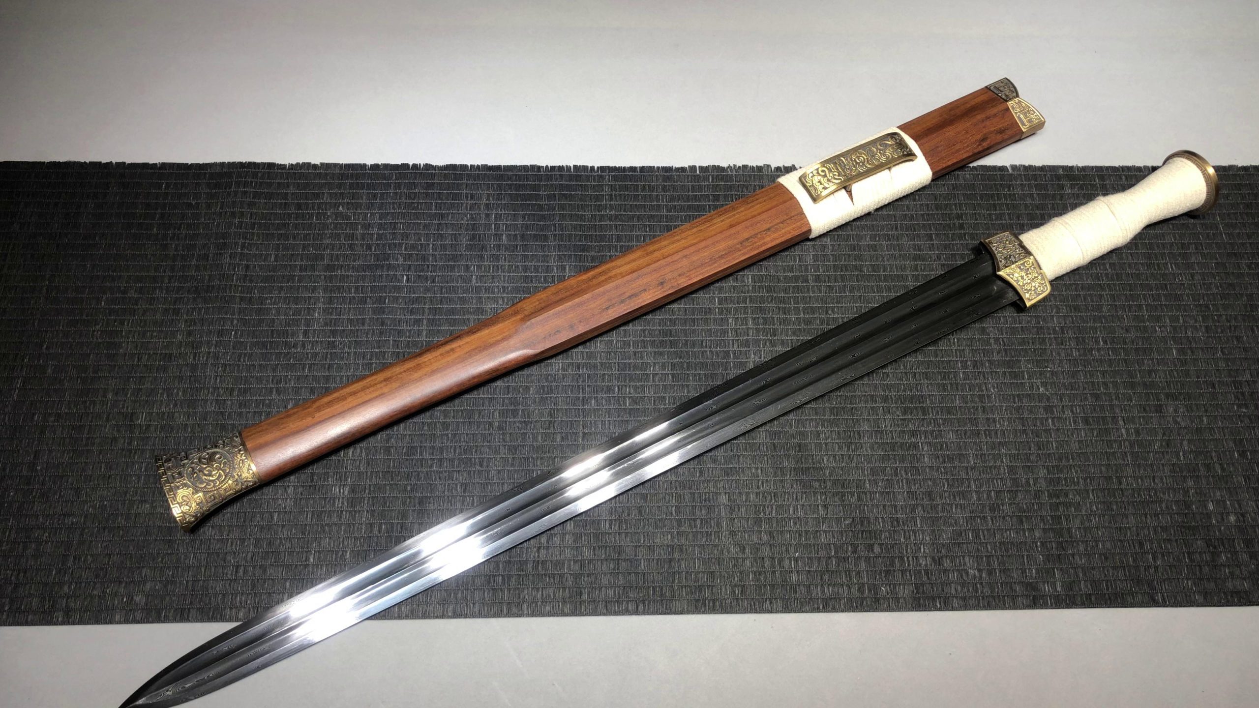 KageForge5 product image: 24" Pattern Steel Japanese Sword with Pure Copper Fittings