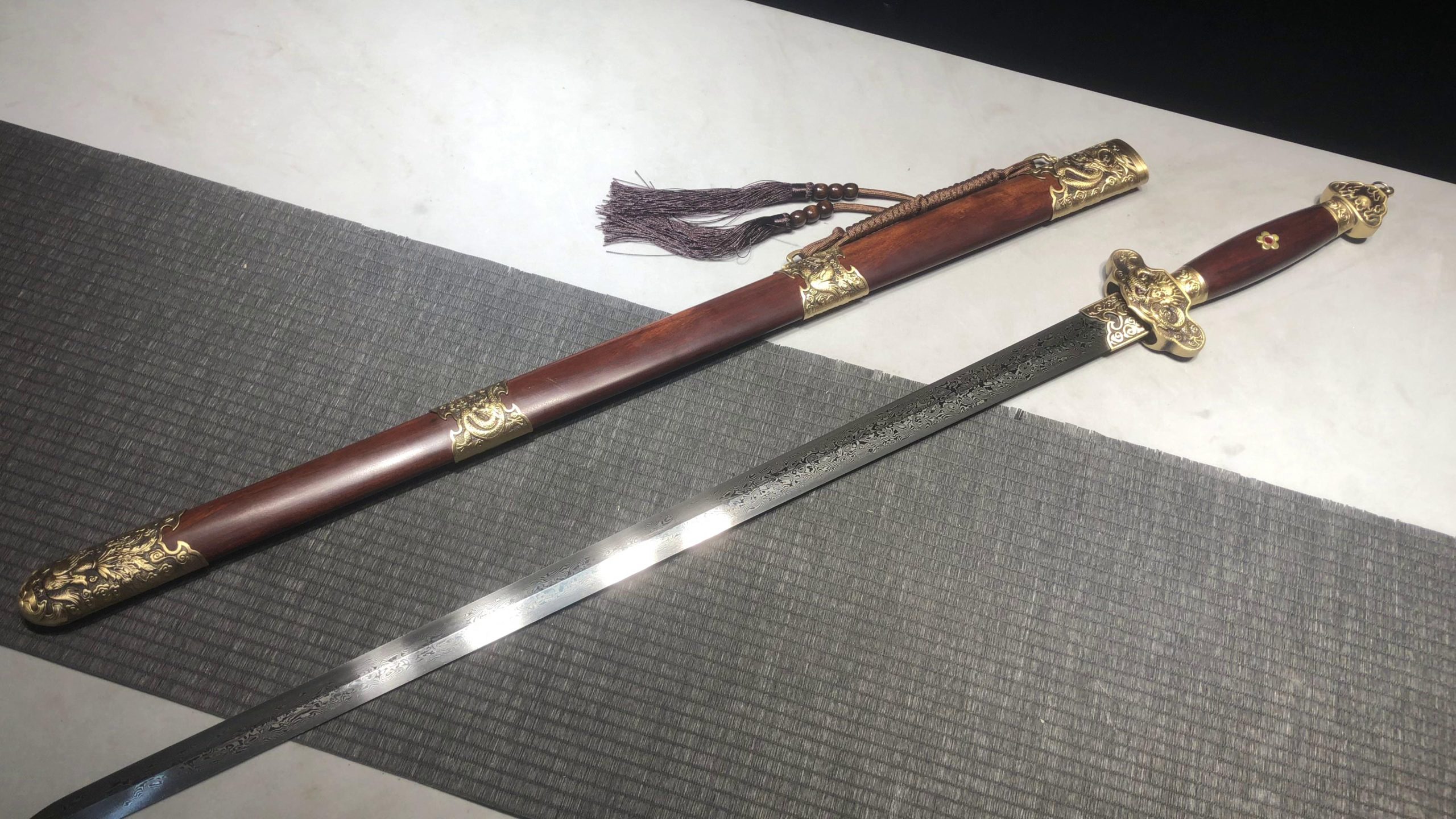 KageForge5 product image: 28" Pattern Steel Japanese Sword with Brass Fittings