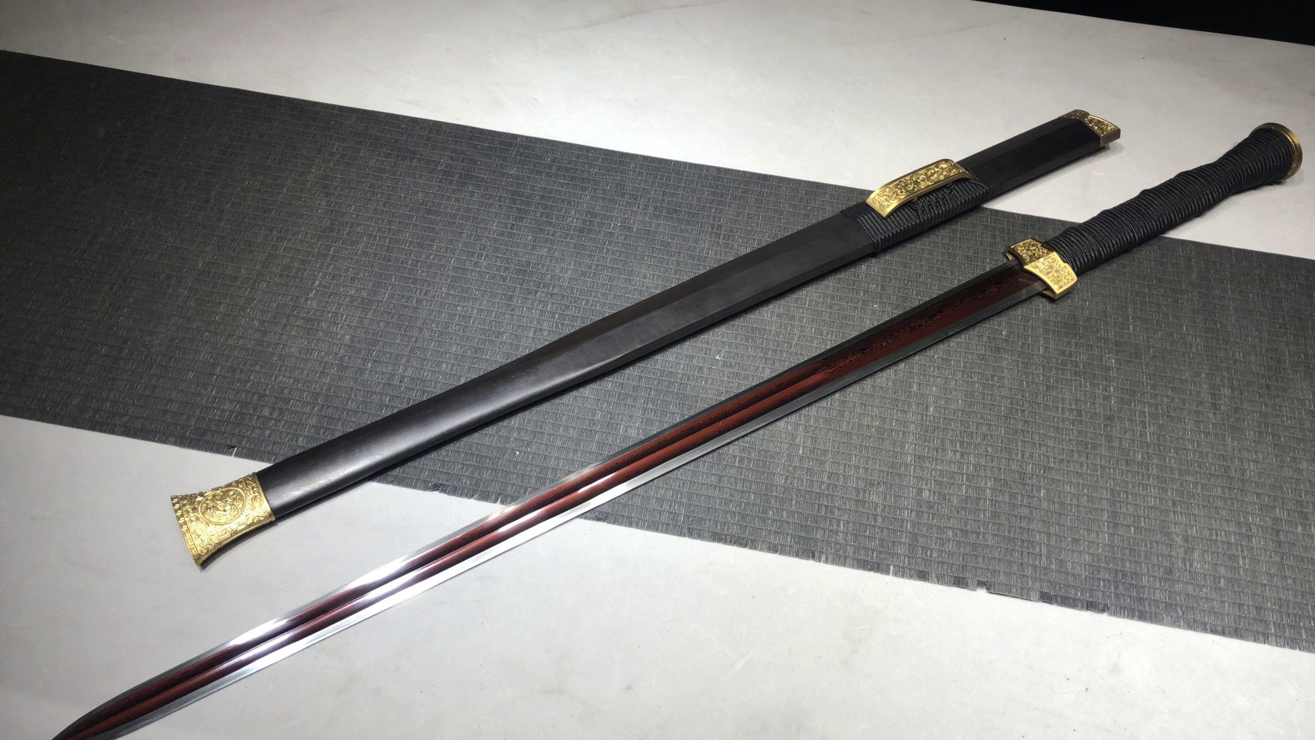 KageForge5 product image: 28" Pattern Steel Japanese Sword with Pure Copper Fittings