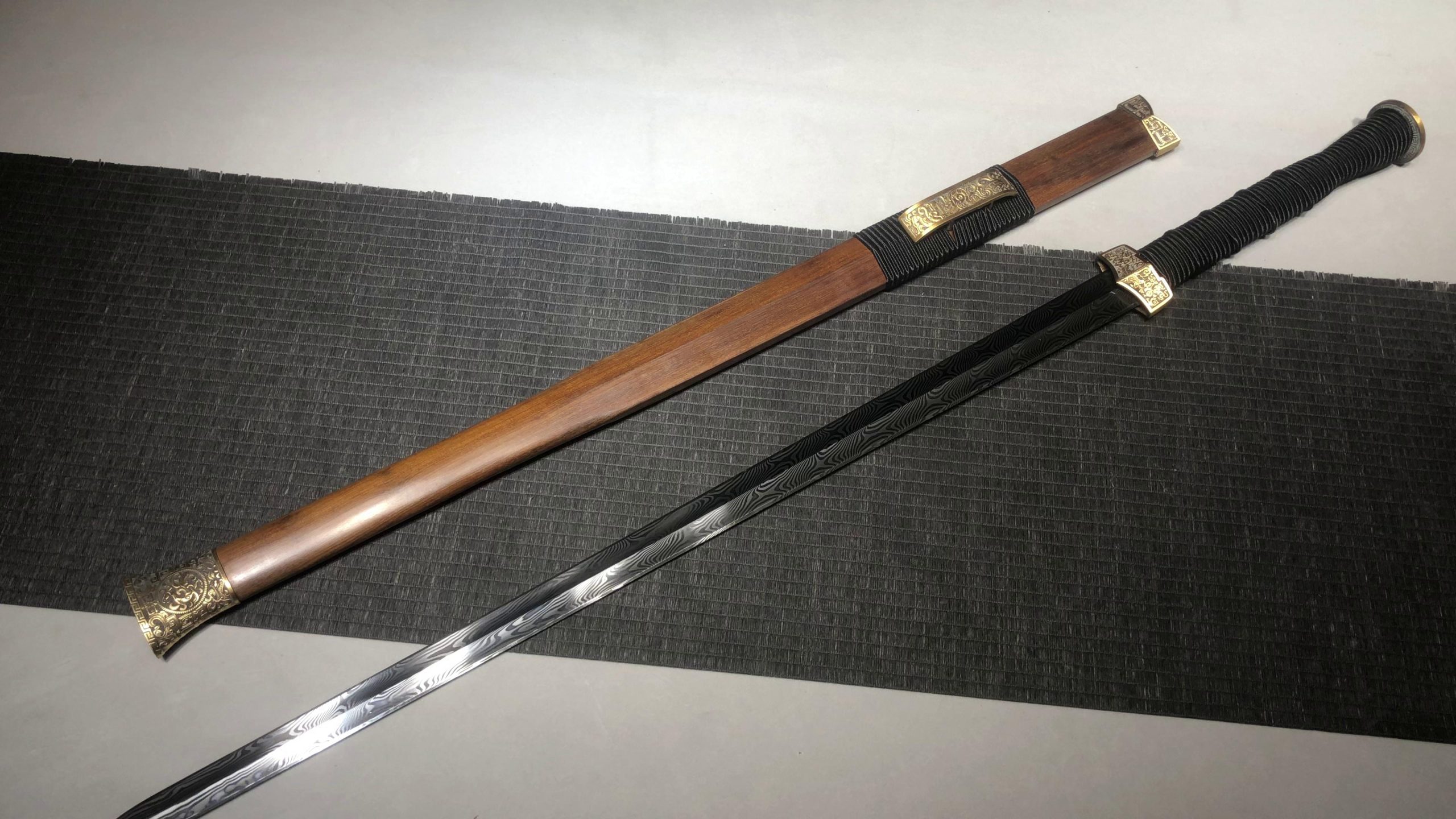 KageForge5 product image: 28" Pattern Steel Japanese Sword with Pure Copper Fittings